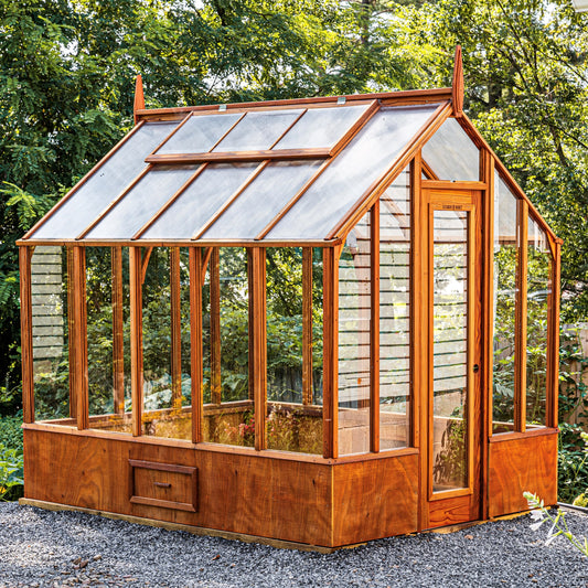 Compact Trillium Greenhouse in Portland backyard garden